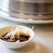 A ginger and soy sauce rests on table at Asian Legend on Monday. Daniel Brenner I AnnArbor.com